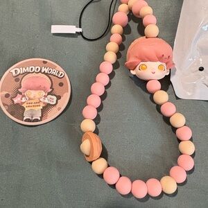 Dimoo World Pink and Cream Beaded Chip and Dale phone chain